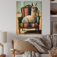 Trinx Ianna Llama Sitting On Lounge Chair In The Dessert - Unframed Print on Wood
