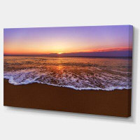 Design Art Orange Tinged Sea Waters at Sunset Photographic Print on Wrapped Canvas