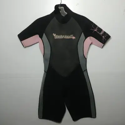 A black and pink wet suit by seadoo. Youth girls size 11/12 does have discoloration and creasing but...