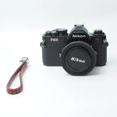 Nikon FM2 w 50mm 1.8 in excellent condition. Price: $500 + tax Includes 60 days / 2 month warranty....