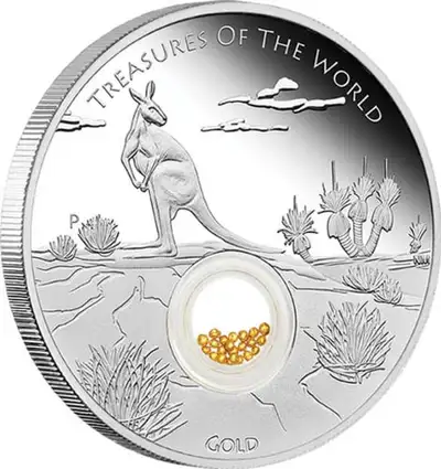 2014 - TREASURES OF THE WORLD SILVER LOCKET COIN WITH GOLD