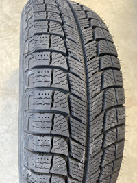 4 pneus dhiver neufs P185/65R14 90T Michelin X-ice Xi3