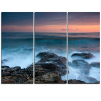 Made in Canada - Design Art Rocky Beach and White Waves - 3 Piece Graphic Art on Wrapped Canvas Set