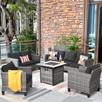 Ebern Designs Lovall Rattan Wicker 7 - Person Seating Group with Fire Pit and Cushions