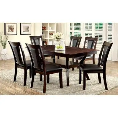 Add some sophistication to your dining environment with this expansive 7 piece dining set. The faux...