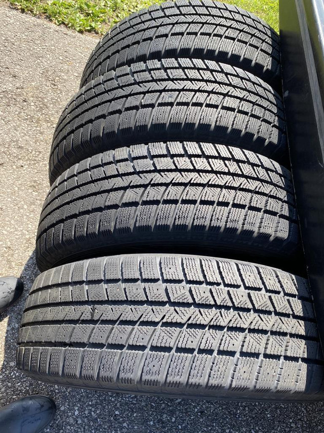 235/65/17 SNOW TIRES GOODYEAR SET OF 4 $740.00 TAG#M1761 (NPLN3002208M2) MIDLAND ON. in Tires & Rims in Ontario