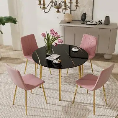 This 5-piece kitchen table set includes a modern round glass dining table and 4 high-quality velvet...