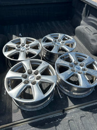 Four used 18 inch Ford F150 Chrome alloy wheels with TMPS sensors