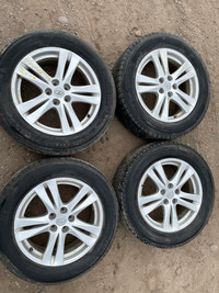 238/60R18  Set of 4 rims and tires that  come off from a 2009 hyundai santa fe.