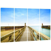 Design Art 'Pier and Lighthouse France' 4 Piece Wrapped Canvas Photograph Set on Canvas