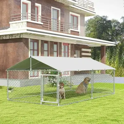 Provide your dogs with the ultimate outdoor haven in this spacious and durable kennel, featuring a r...