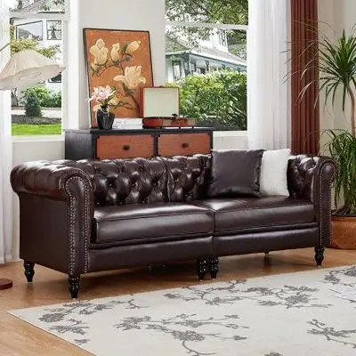 This sofa has space for three and anchors your living room or den with dynamic looks and vintage-ins...