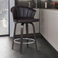 Ebern Designs Vandt Swivel Counter or Bar Height Bar Stool with Chrome Footrest in Brown Faux Leather and Plywood