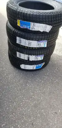 BRAND NEW WITH LABELS ULTRA HIGH PERFORMANCE  MICHELIN  195 / 65 / 15  WINTER  TIRE     SET OF     FOUR.