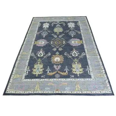 Hand knotted oushak & peshawar rugs are highly demanded by interior designers. They are known for th...