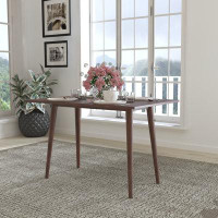 Wade Logan Amittai Mid-Century Modern Wooden Dining Table with Tapered Legs - Seats 4