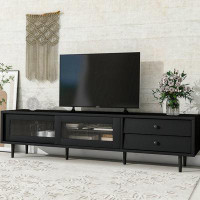 Ebern Designs TV Stand with Sliding Fluted Glass Doors, Slanted Drawers Media Console for TV