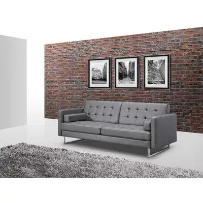 Sed98 With a look and feel like leather this 80-inch grey faux leather and silver sofa is made from...