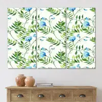East Urban Home Tropical Leaves With Little Blue Flowers - Patterned Canvas Wall Art Print