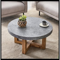 Ivy Bronx A modern retro circular coffee table with a diameter of 31.4 inches, made of MDF material