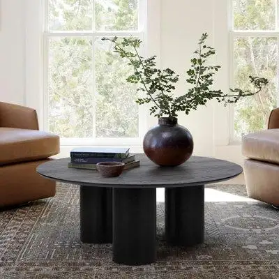 Crafted with genuine WHITE OAK! If you are looking for a low-profile round wood coffee table this is...