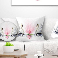 East Urban Home Animal Floating Swans on Background Pillow