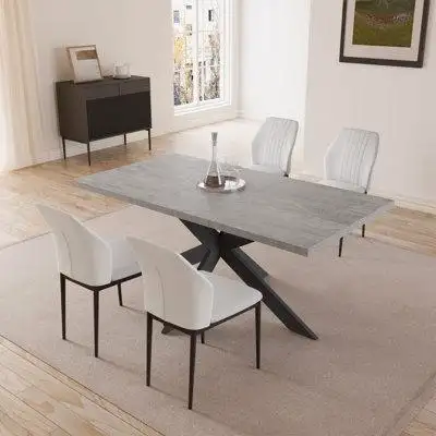 Contemporary flair and sleek style to any space of your home with this elegant dining table set. The...