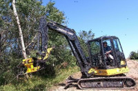 TMK Tree Shears for skid steers, excavators, loaders, etc. Cut and hold the trees and brush.