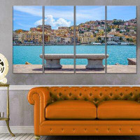 Design Art 'Seafront Bench in Port Santo Stefano' Photographic Print Multi-Piece Image on Canvas