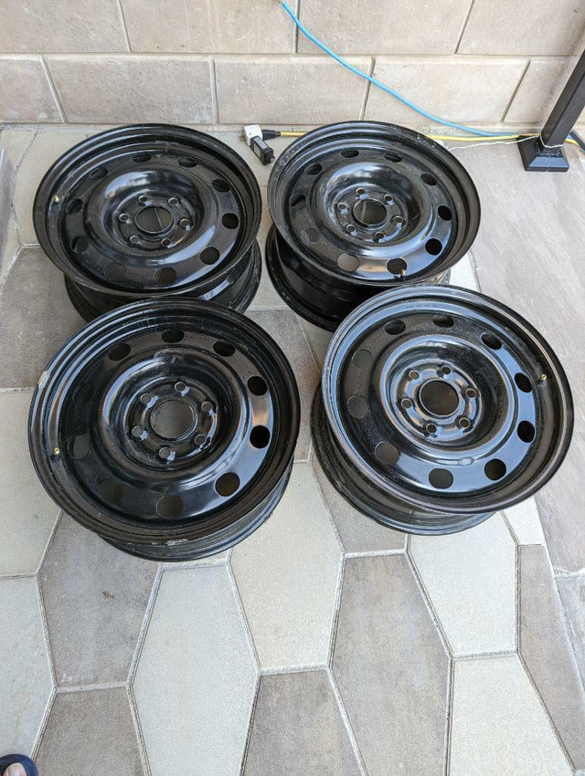 BRAND NEW TAKE OFF    17 INCH  CHEVY TRAVERSE / GMC ACADIA    STEEL WHEEL SET OF   FOUR in Tires & Rims in Ontario