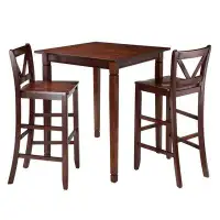 Gracie Oaks Landyon 4 - Person Counter Height Solid Wood Dining Set