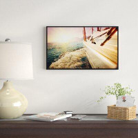 East Urban Home 'Huge Yacht Sailing Against Sunset' Framed Photographic Print on Wrapped Canvas