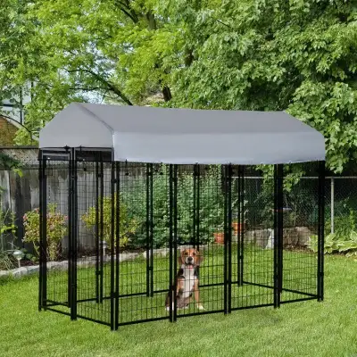 Give your furry friend the perfect home with this dog kennel, featuring rust-resistant wire, a sturd...