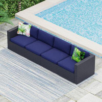 Lark Manor Mcgahan 110'' Wide Outdoor Wicker Patio Sectional with Cushions