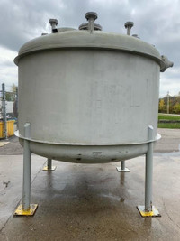 Tank with heating coil