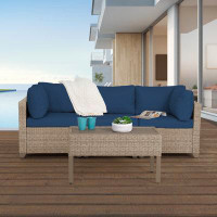 Wade Logan Aranka 4-Piece Outdoor Conversation Set Including Coffee Table in Natural Aged Wicker