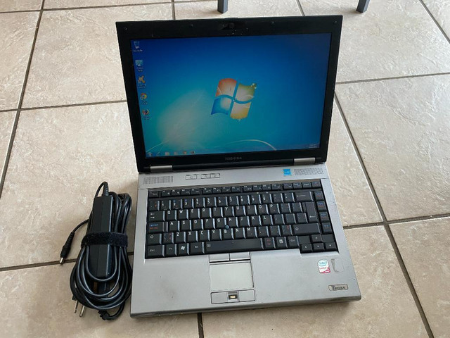 Used Toshiba Tecra M10 Laptopwith Intel Core 2 Duo Processor, Serial Port, DVD and Wireless for Sale (Candeliver ) in Laptops in Hamilton