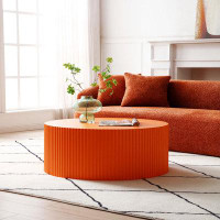 Ivy Bronx Sleek And Modern Round Coffee Table With Eye-Catching Relief Design
