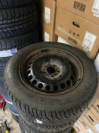 FOUR USED 16 INCH 5X108 STEEL WHEELS WITH 225 55 R16 GISLAVED NORFROST TIRES —