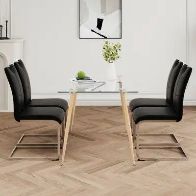 Transform your dining space with this sophisticated 5-piece dining set a perfect blend of modern ele...