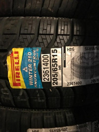 TWO NEW 205 / 65 R15 PIRELLI WINTER 210 ICE TIRES