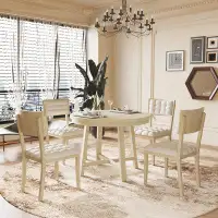 Gracie Oaks Round Dining Table Set with Cross Legs and Upholstered Dining Chairs
