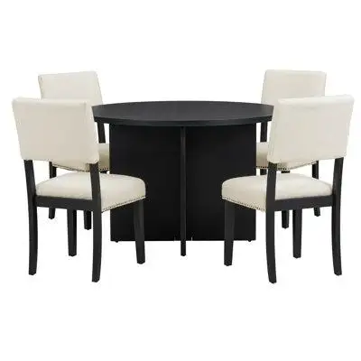 This 5-piece modern dining set includes a round table and 4 chairs with sturdy pine wood legs and co...
