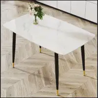 Ebern Designs Modern minimalist dining table. White imitation marble pattern SINTERED STONE desktop