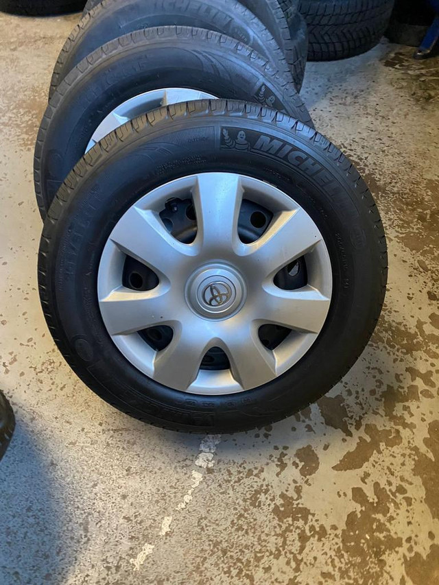 15 INCH STEEL WHEELS WITH 205 65 R15 MICHELIN DEFENDER in Tires & Rims in Toronto (GTA)