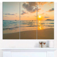 Design Art 'Stylish Blur SunMulti-Piece Image over the Sea' Photographic Print Multi-Piece Image on Canvas