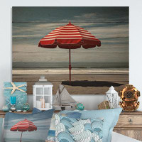 Dovecove Huchinson Coastal Beach Red Umbrella On Wood Print