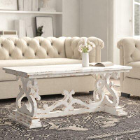 Kelly Clarkson Home Emersyn 46" Solid Wood Distressed Scrollwork Coffee Table
