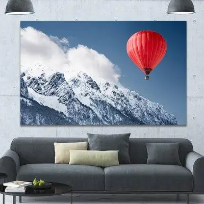 Made in Canada - Design Art 'Balloon Over Winter Hills' Photographic Print on Wrapped Canvas