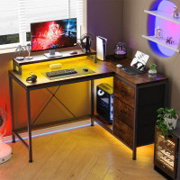 Ebern Designs L Shaped Desk With Power Outlets & LED Lights
